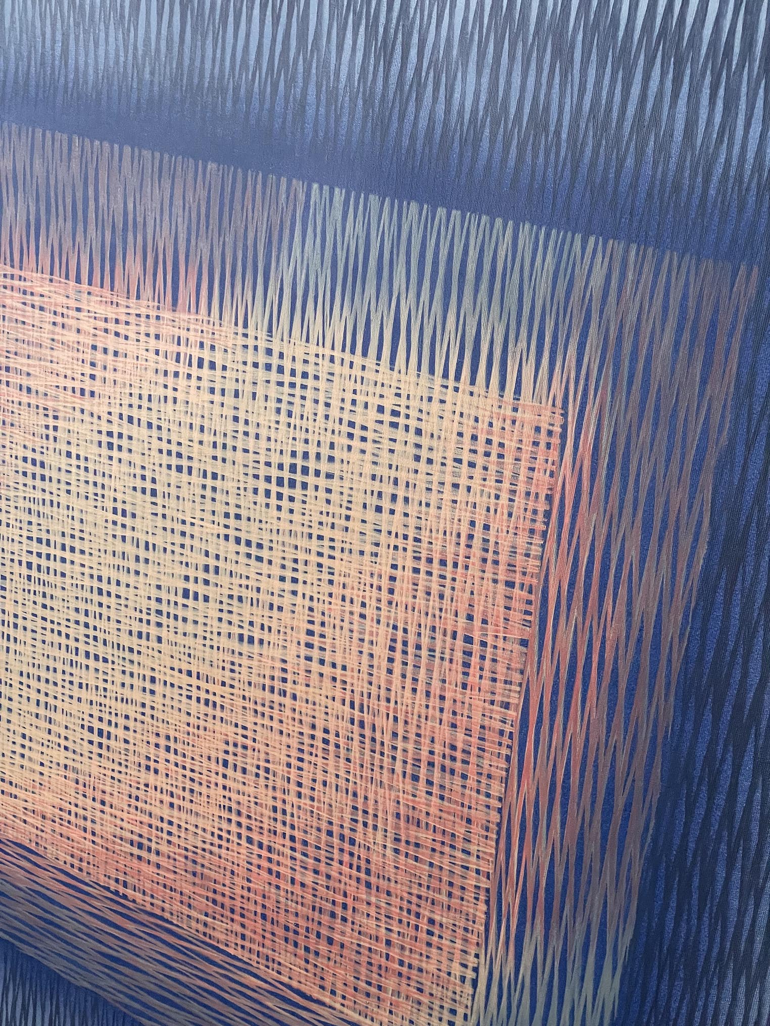 Close-up of a acrylic painting with blue and pink patterns
