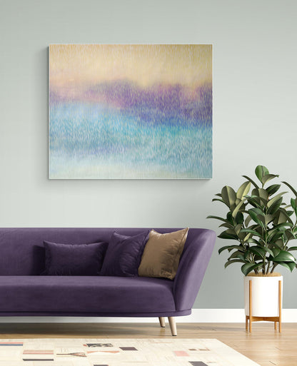 Purple sofa with decorative pillows in a room with a colorful abstract painting on the wall.