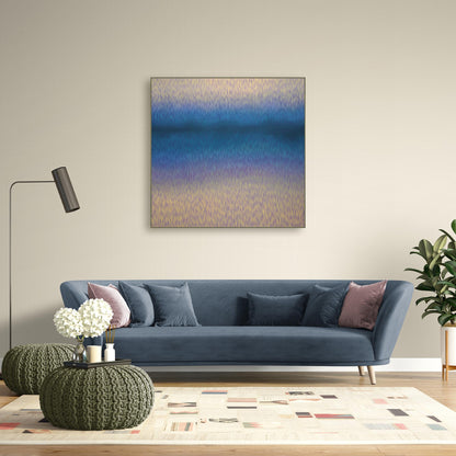 Modern living room with a painting of a landscape on the wall, a white console table, and decorative plants.