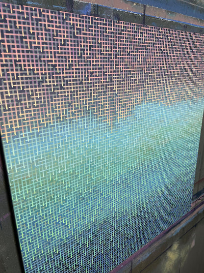 Close-up of a textured artwork surface with a gradient from blue to green.