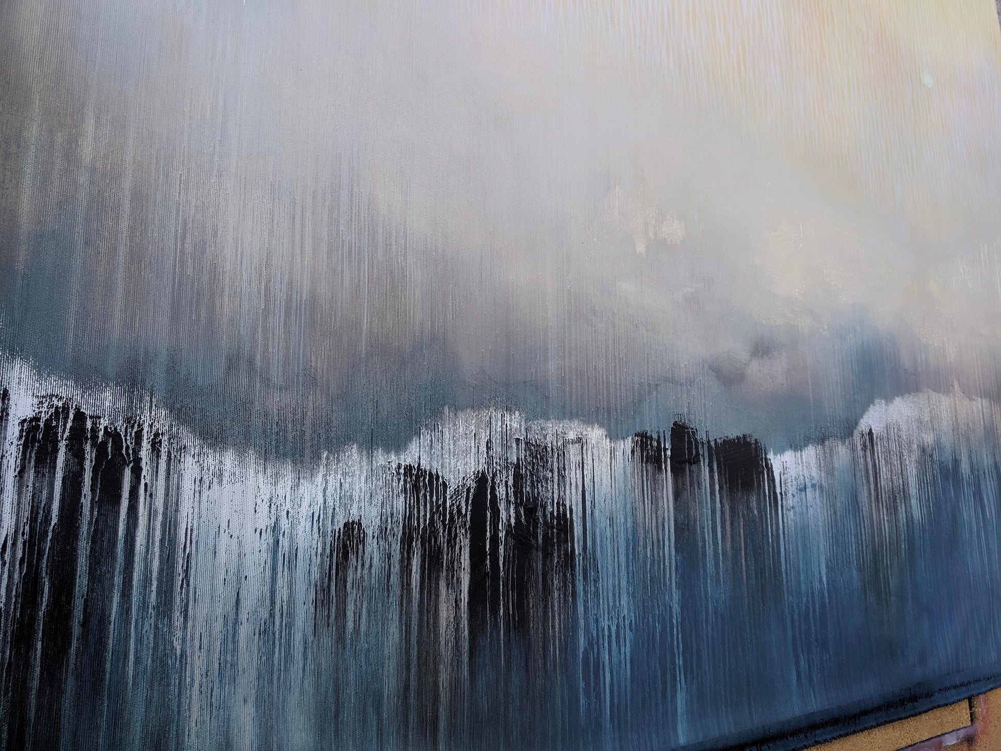 Abstract art with black and white brush strokes on a textured surface
