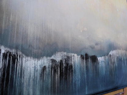 Abstract art with black and white brush strokes on a textured surface