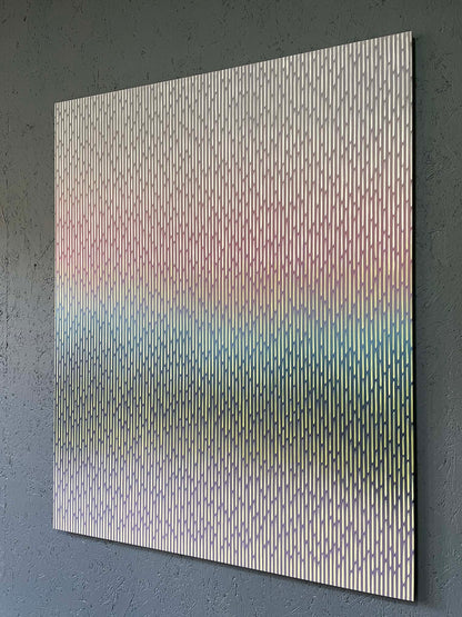 Abstract art piece with gradient colors on a gray background
