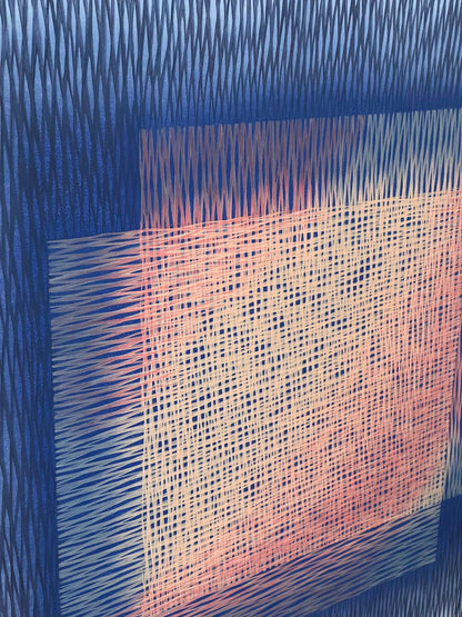 Close-up of a painting with blue and pink patterns