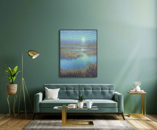 Modern living room with a green sofa, decorative painting, and side tables.