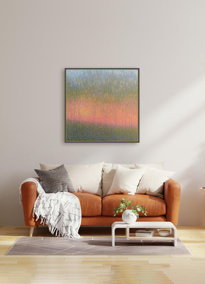 Living room with an orange sofa, decorative pillows, a small table with a plant, and a colorful abstract painting on the wall.