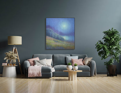 Living room with a gray sofa, decorative pillows, a small table, and a painting on the wall.