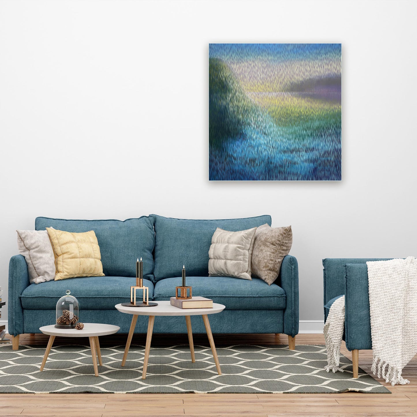 Living room with blue sofa, decorative pillows, and a colorful abstract painting on the wall.