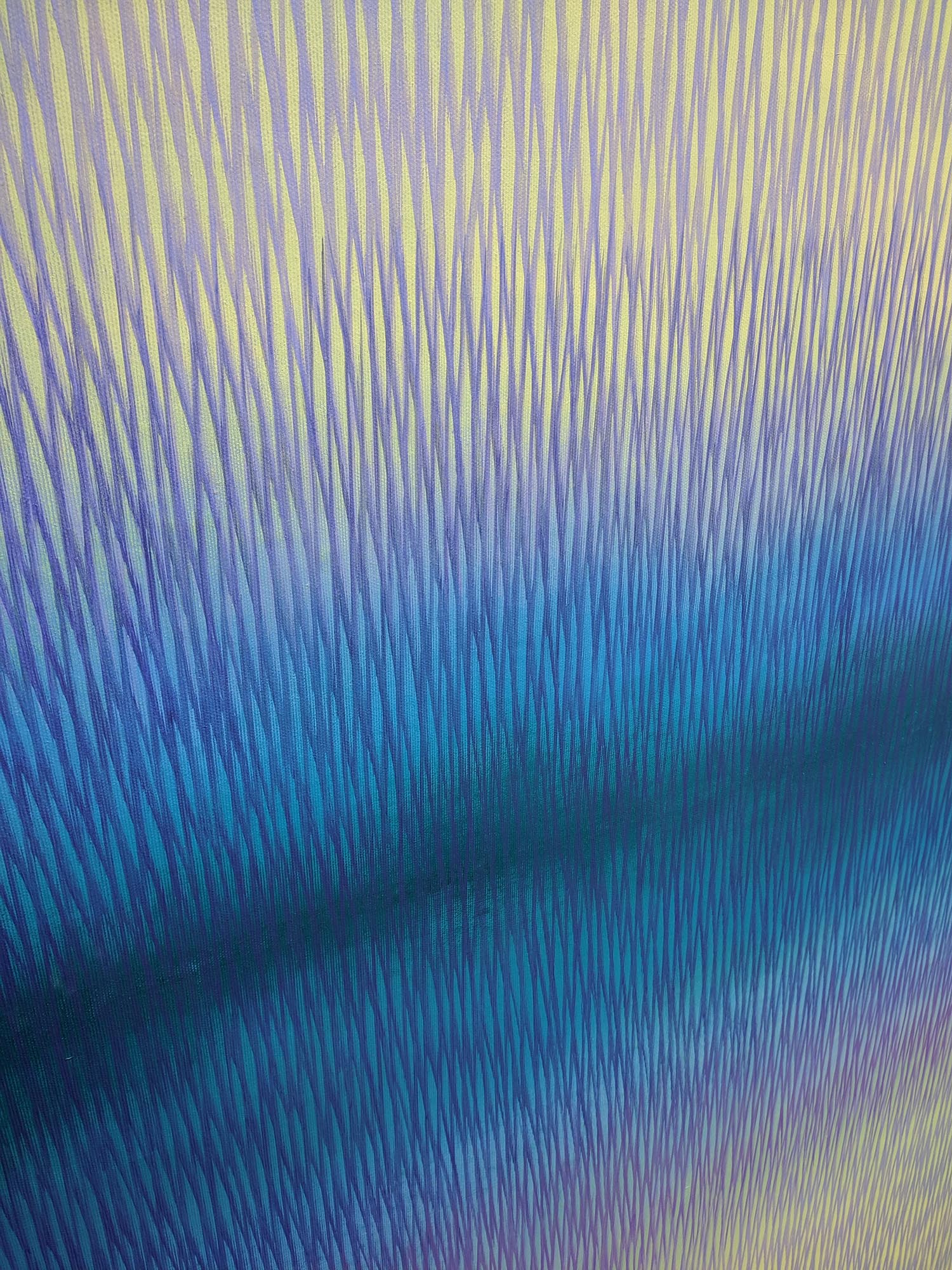 Close-up of blue and yellow painting texture