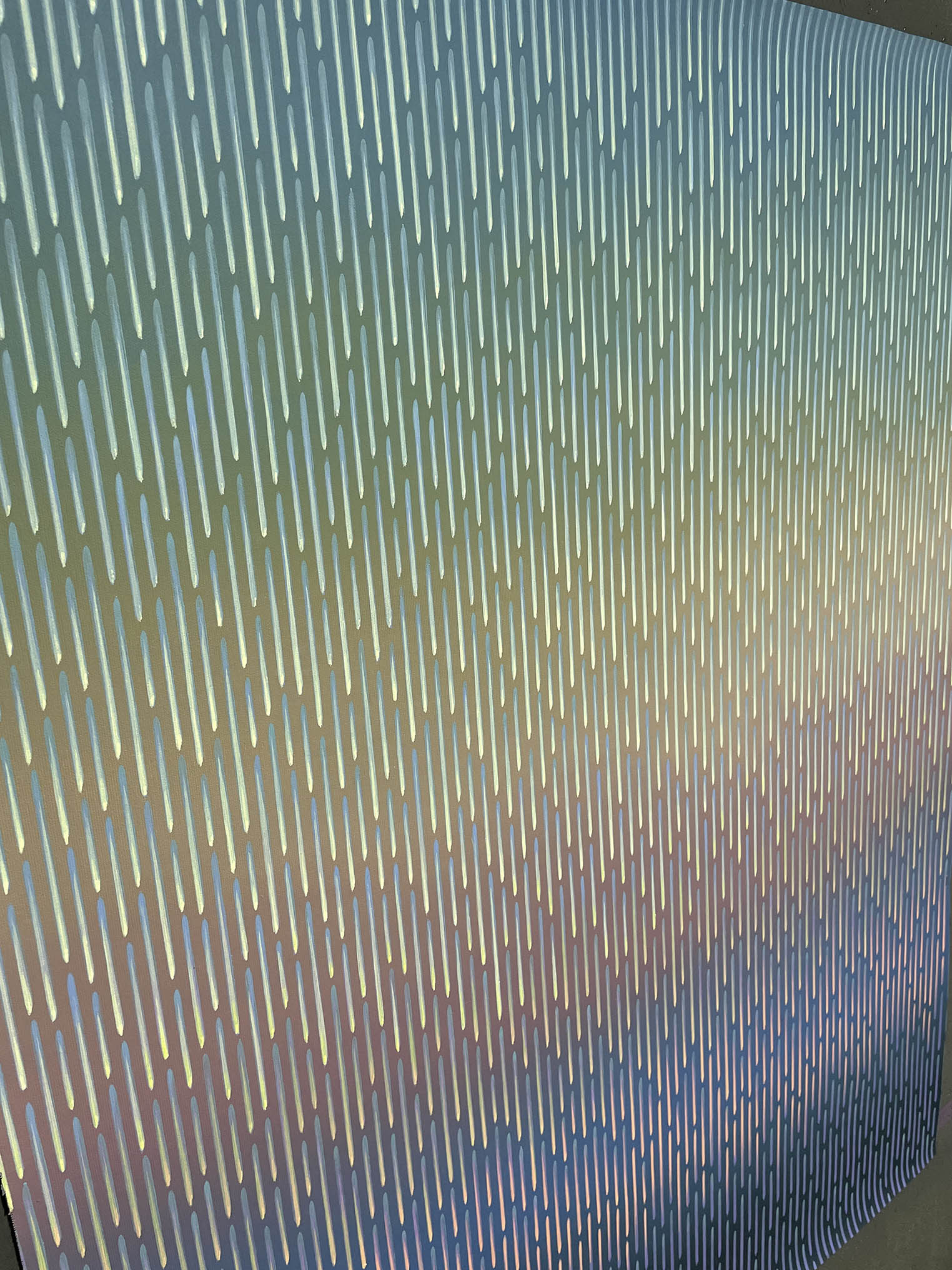 Close-up of the rhythmic vertical pattern mimicking falling rain over a misty ocean horizon in Mirage No. 77
